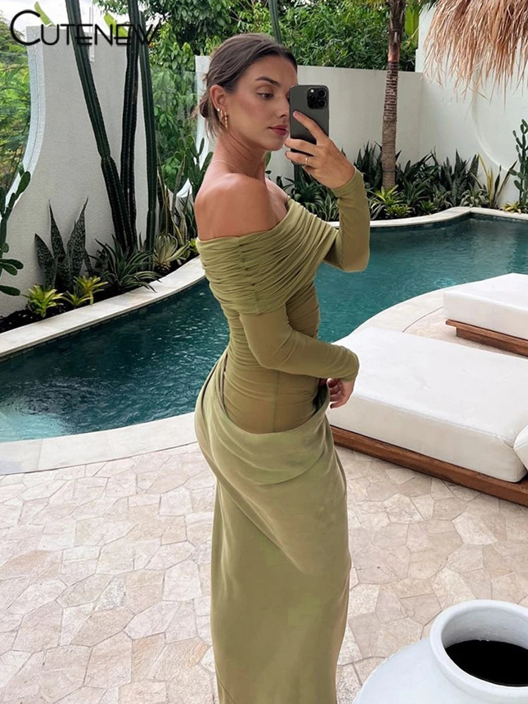 10055# Vestido longo feminino de malha com babados