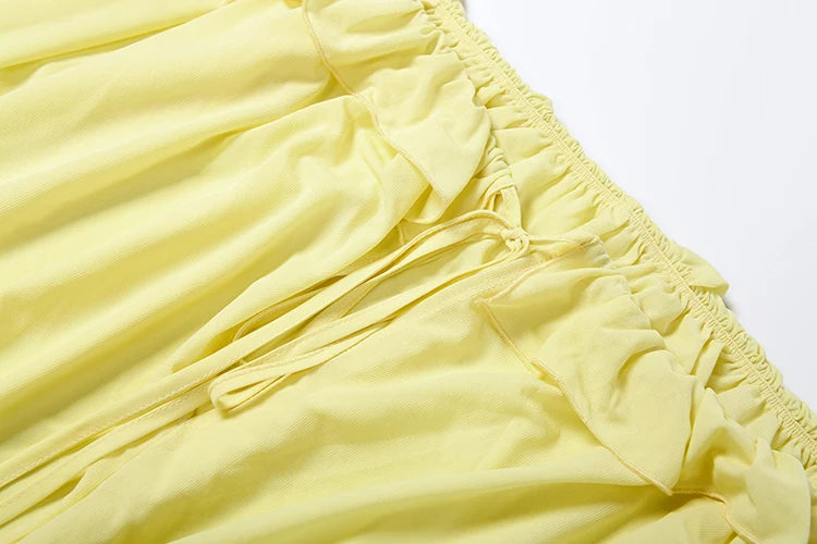 Vestido vazado com babados , transparente decote em V, mangas compridas, ideal para praia, festa de fim de ano